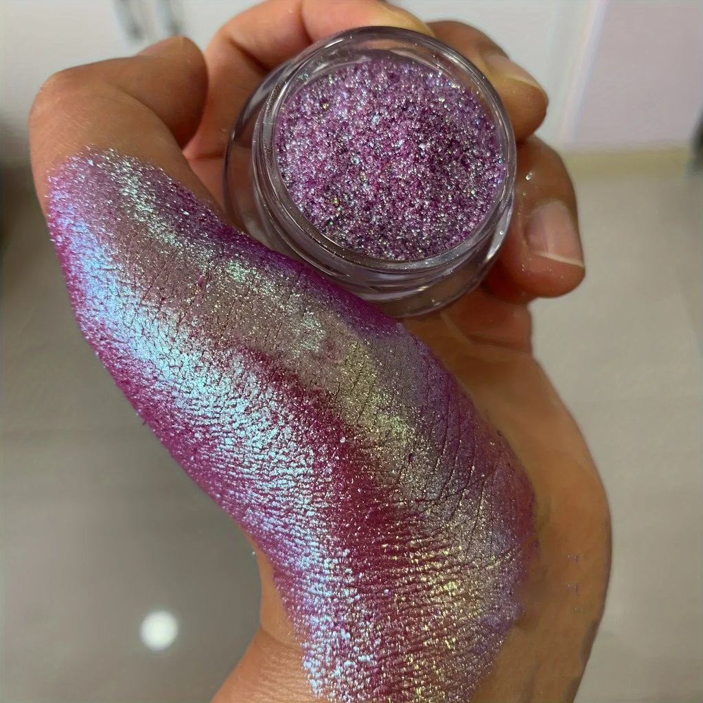 Polvo glitter aurora camaleón vibrante, degradado multicolor, tonos mora, morado, azul y verde, maquillaje corporal deslumbrante
